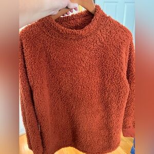 Fleece mock turtleneck.